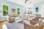 Beautiful Pottery Barn slipcovered furniture is the perfect spot to relax after a day at the beach